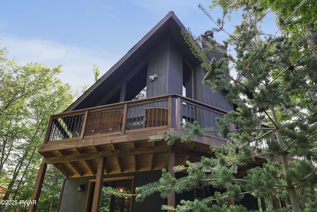 1706 Windemere Ct, Lake Ariel, PA 18436 - rear view of house with a chimney and a wooden deck