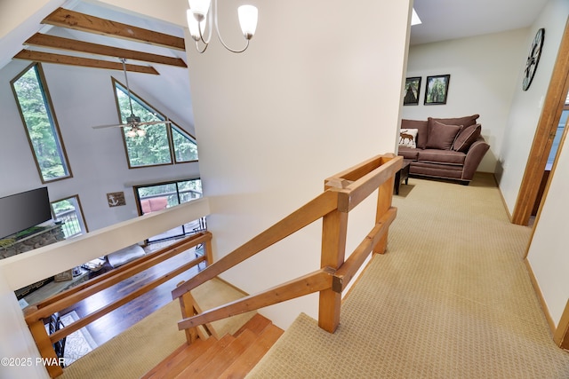 1706 Windemere Ct, Lake Ariel, PA 18436 - staircase with healthy amount of natural light, carpet floors, a high ceiling, beam ceiling, and a chandelier