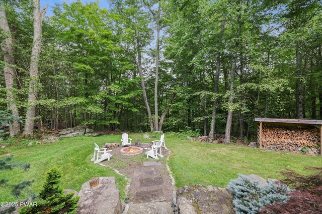 1706 Windemere Ct, Lake Ariel, PA 18436 - view of green lawn featuring an outdoor fire pit
