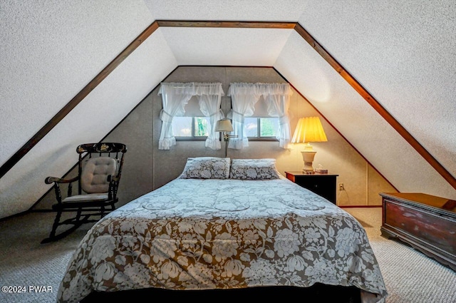 carpeted bedroom with lofted ceiling and a textured ceiling