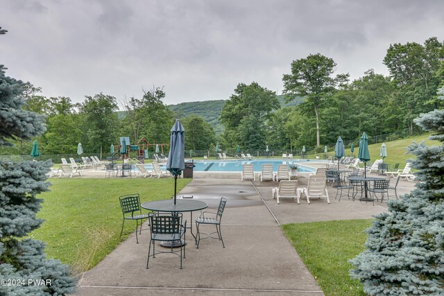 view of patio / terrace with a community pool