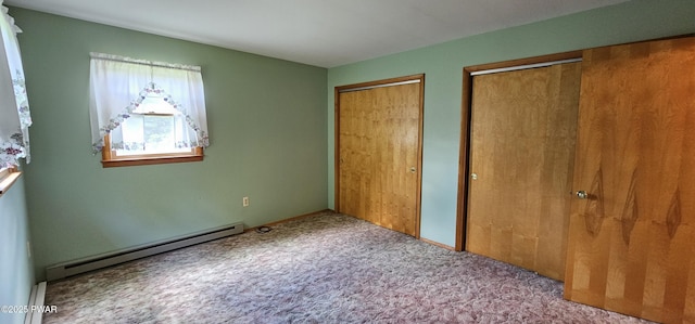 24 Buff Rd, Cochecton, Ny, NY 12726 - unfurnished bedroom with multiple closets, a baseboard heating unit, and carpet