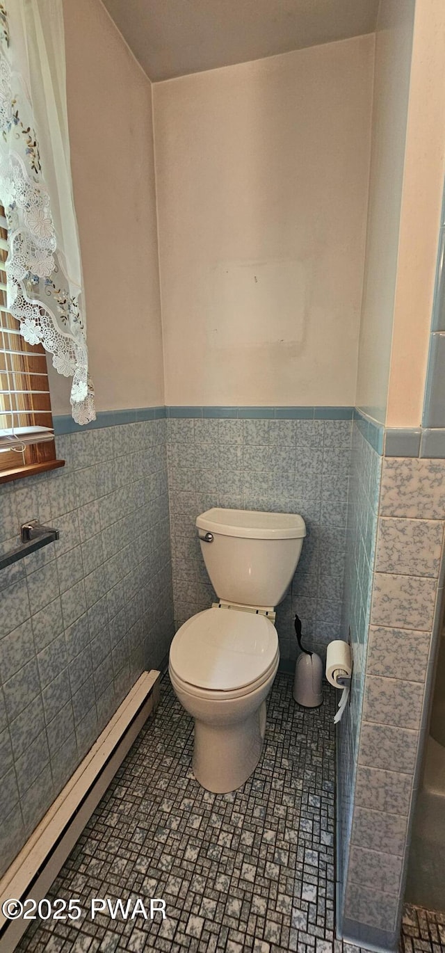 24 Buff Rd, Cochecton, Ny, NY 12726 - bathroom with wainscoting, toilet, and tile walls