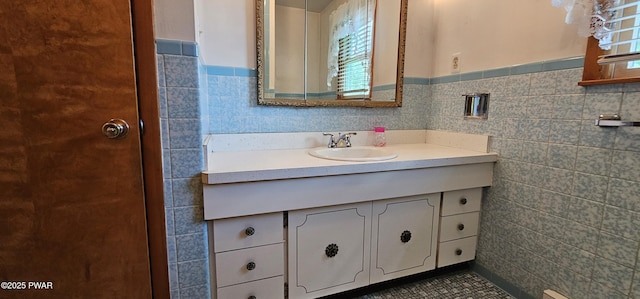 24 Buff Rd, Cochecton, Ny, NY 12726 - bathroom featuring tile walls, vanity, a wainscoted wall, and tile patterned flooring