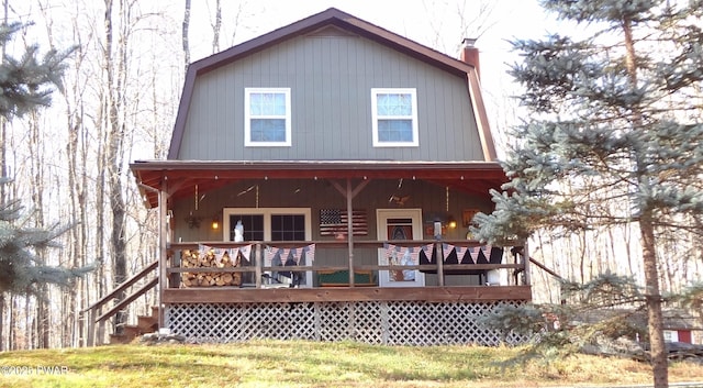 view of outbuilding featuring a yard