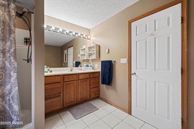 216 Comstock Dr, Lords Valley, PA 18428 - full bath with a textured ceiling, vanity, tile patterned floors, and a shower with curtain