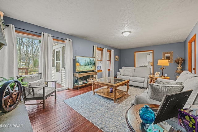 216 Comstock Dr, Lords Valley, PA 18428 - living area with a textured ceiling and hardwood / wood-style floors