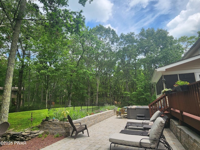216 Comstock Dr, Lords Valley, PA 18428 - view of patio featuring a hot tub and a sunroom
