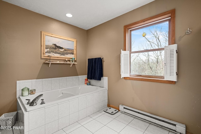 216 Comstock Dr, Lords Valley, PA 18428 - bathroom featuring a baseboard radiator, a garden tub, and tile patterned flooring