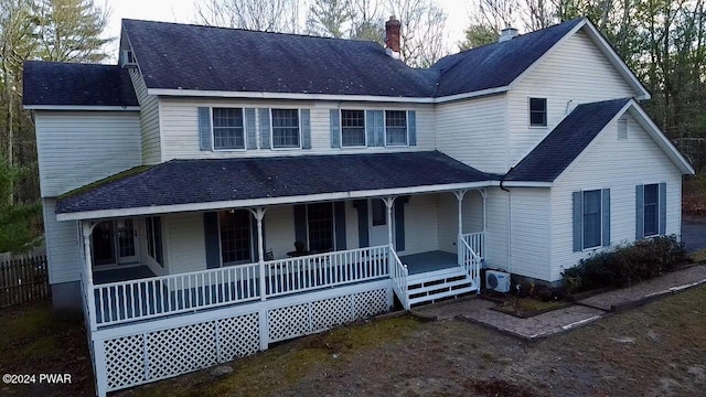 view of front of property featuring covered porch