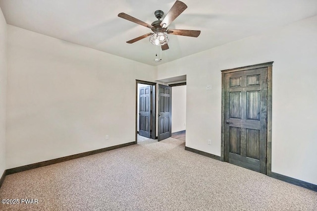 unfurnished bedroom featuring ceiling fan and light carpet