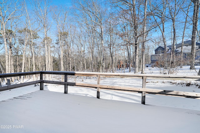 view of snow covered deck