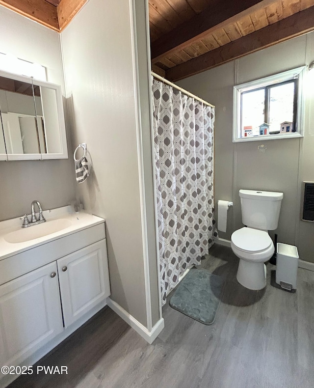 full bathroom with beam ceiling, toilet, wood ceiling, and wood finished floors