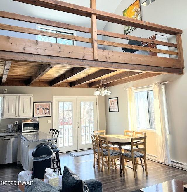 dining space with beam ceiling, french doors, wood ceiling, a chandelier, and dark wood-style flooring