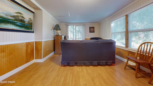 10 Kane Rd, Starlight, PA 18461 - living room with wood finished floors, ornamental molding, a wainscoted wall, and wooden walls