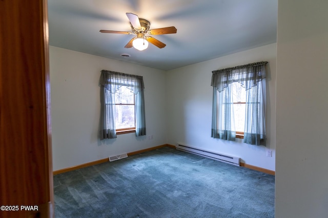 carpeted empty room with a ceiling fan, baseboards, visible vents, and baseboard heating