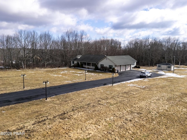 view of yard with an attached garage