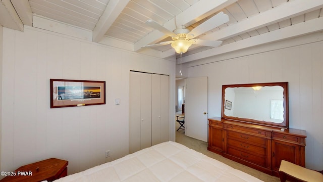 802 Rimrock Ct, Lords Valley, PA 18428 - bedroom with wooden ceiling, beam ceiling, ceiling fan, light carpet, and a closet