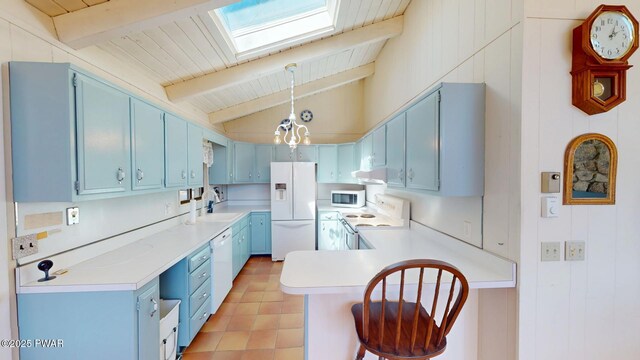 802 Rimrock Ct, Lords Valley, PA 18428 - kitchen with light countertops, blue cabinets, a peninsula, and white appliances