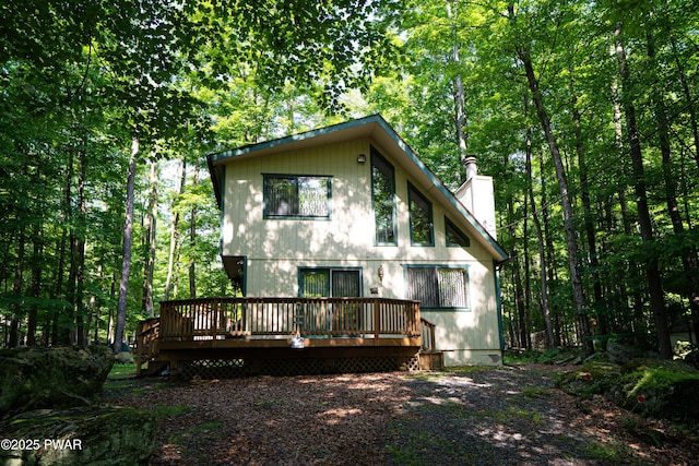 28 Lakewood Dr, Lake Ariel, PA 18436 - back of house featuring a chimney and a deck