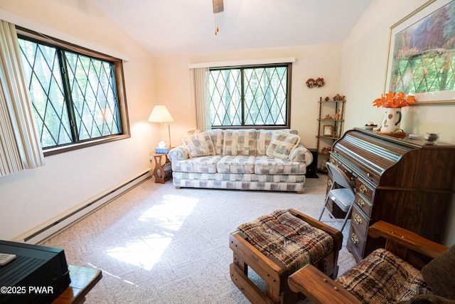 28 Lakewood Dr, Lake Ariel, PA 18436 - carpeted living area with vaulted ceiling, baseboard heating, healthy amount of natural light, and a ceiling fan
