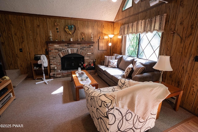 28 Lakewood Dr, Lake Ariel, PA 18436 - carpeted living room featuring wooden walls, vaulted ceiling, a textured ceiling, and a fireplace