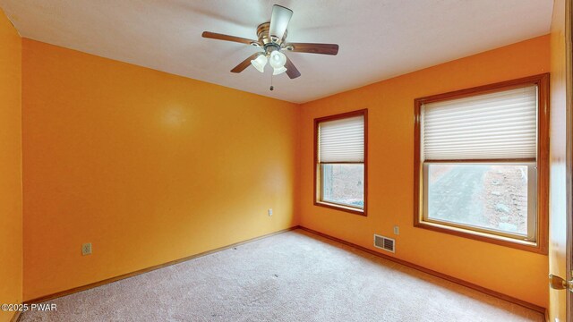 living room with a textured ceiling and light colored carpet