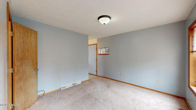 kitchen with washer and clothes dryer and white refrigerator