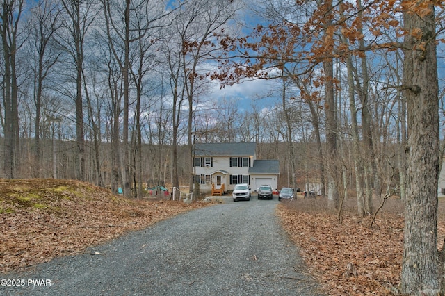 view of front of property with a garage