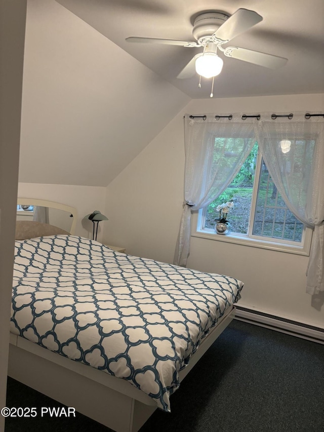 106 Keystone Ct, Dingmans Ferry, PA 18328 - bedroom featuring baseboard heating, lofted ceiling, and a ceiling fan