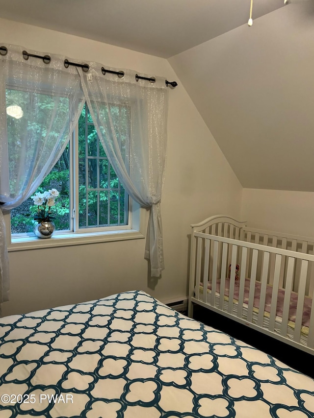106 Keystone Ct, Dingmans Ferry, PA 18328 - bedroom with multiple windows, lofted ceiling, and baseboard heating
