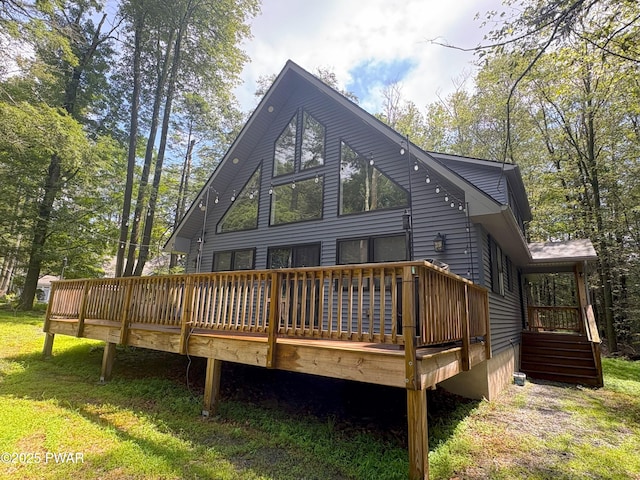 1006 Redlawn Ln, Lake Ariel, PA 18436 - rear view of property featuring a wooden deck and a yard