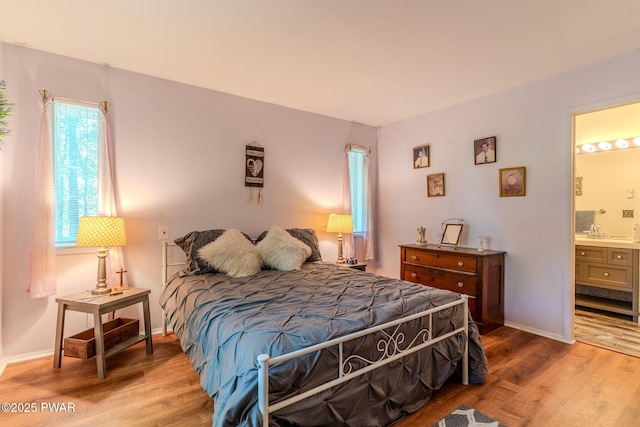 53 Windsor Rd, Hawley, PA 18428 - bedroom with wood finished floors and ensuite bathroom