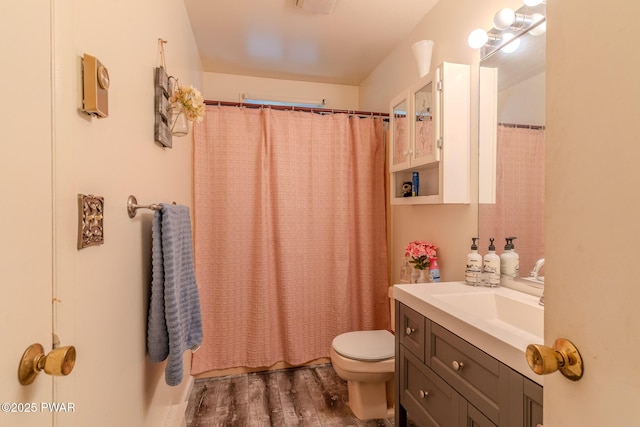53 Windsor Rd, Hawley, PA 18428 - full bath featuring wood finished floors, vanity, and a shower with curtain