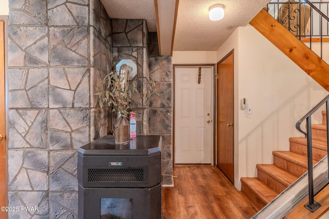 53 Windsor Rd, Hawley, PA 18428 - entrance foyer featuring wood finished floors, stairway, and a textured ceiling