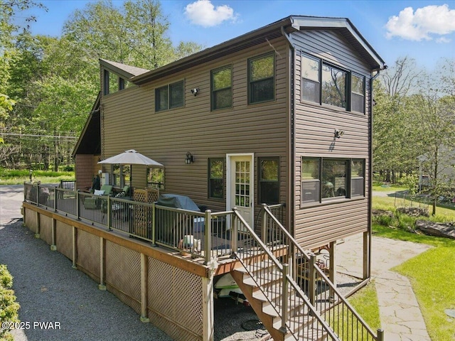 1057 K Ln, Gouldsboro, PA 18424 - rear view of house with a deck