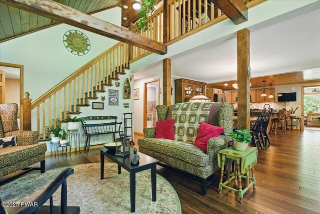 1057 K Ln, Gouldsboro, PA 18424 - living room with stairs, beam ceiling, hardwood / wood-style flooring, and high vaulted ceiling
