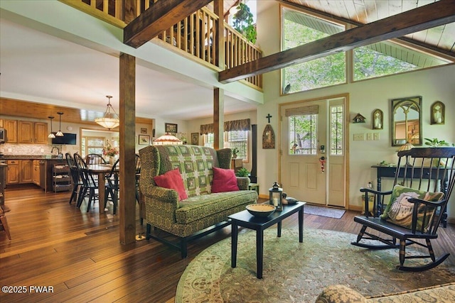 1057 K Ln, Gouldsboro, PA 18424 - living area featuring dark wood finished floors and beam ceiling