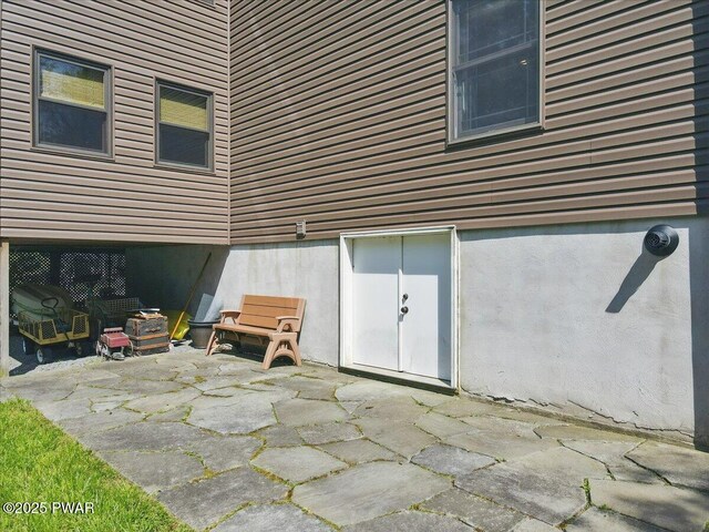 1057 K Ln, Gouldsboro, PA 18424 - rear view of house with a patio