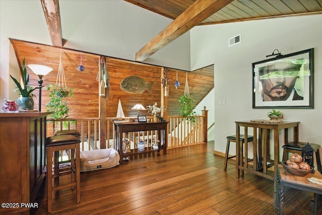 1057 K Ln, Gouldsboro, PA 18424 - living area with an upstairs landing, wood ceiling, wooden walls, hardwood / wood-style floors, and baseboards