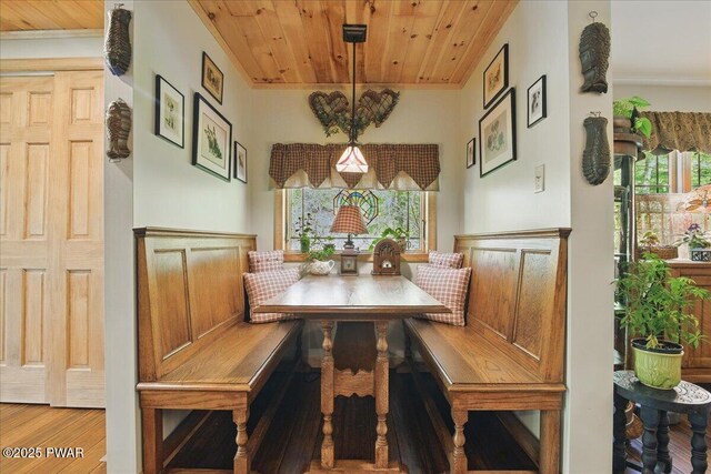 1057 K Ln, Gouldsboro, PA 18424 - dining area featuring breakfast area, wooden ceiling, ornamental molding, and wood finished floors