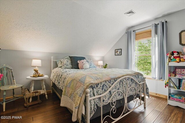 1057 K Ln, Gouldsboro, PA 18424 - bedroom with lofted ceiling, hardwood / wood-style flooring, a textured ceiling, and baseboards