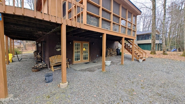 exterior space with french doors and stairs