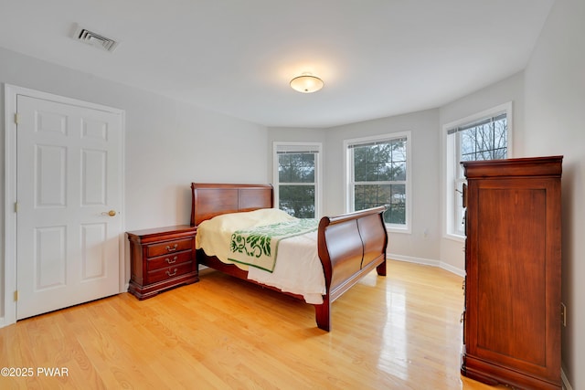 129 Lakewood Dr, Dingmans Ferry, PA 18328 - bedroom with light wood-style floors and baseboards