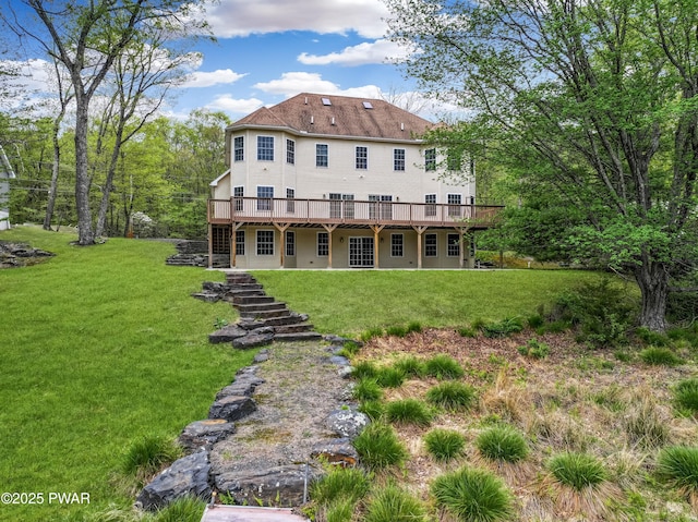 129 Lakewood Dr, Dingmans Ferry, PA 18328 - back of property with a wooden deck, a yard, and stairs