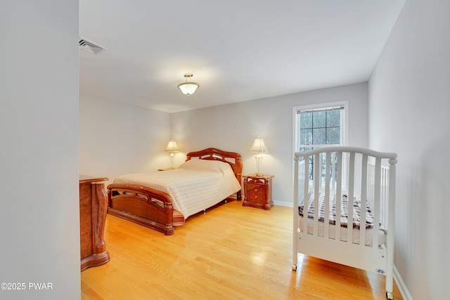 129 Lakewood Dr, Dingmans Ferry, PA 18328 - bedroom with light wood finished floors