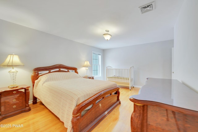 129 Lakewood Dr, Dingmans Ferry, PA 18328 - bedroom with light wood finished floors and baseboards