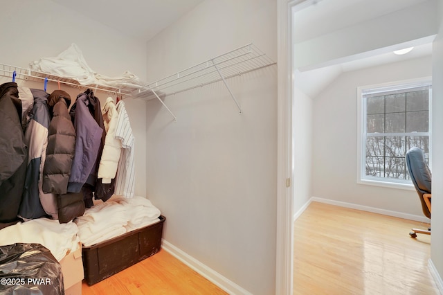 129 Lakewood Dr, Dingmans Ferry, PA 18328 - spacious closet featuring wood finished floors and lofted ceiling