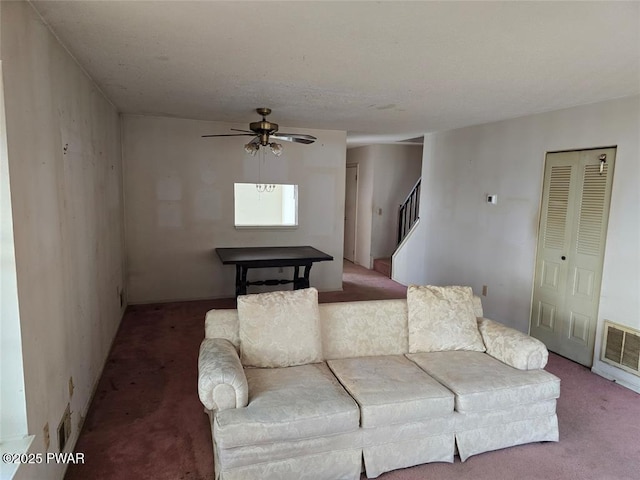 29 Burnett Way, Washingtonville, NY 10992 - carpeted living area featuring a ceiling fan and stairway