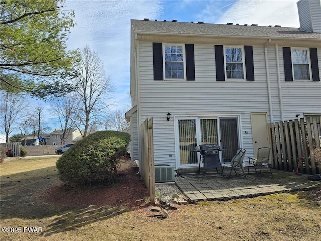29 Burnett Way, Washingtonville, NY 10992 - back of property featuring fence, cooling unit, and a patio